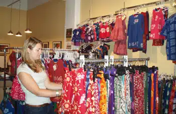 A customer shops at the Global Mamas’ Second Saturday sale in Minneapolis, MN. A customer shops at the Global Mamas’ Second Saturday sale in Minneapolis, MN.