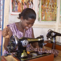 Visiting a seamstress during the Fair Trade Tour at the Global Mamas Cape Coast office