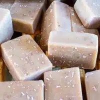 Global Mamas Soapmaking Workshop at the Global Mamas Fair Trade Zone with Honey Lemon Oatmeal soap curing before packaging