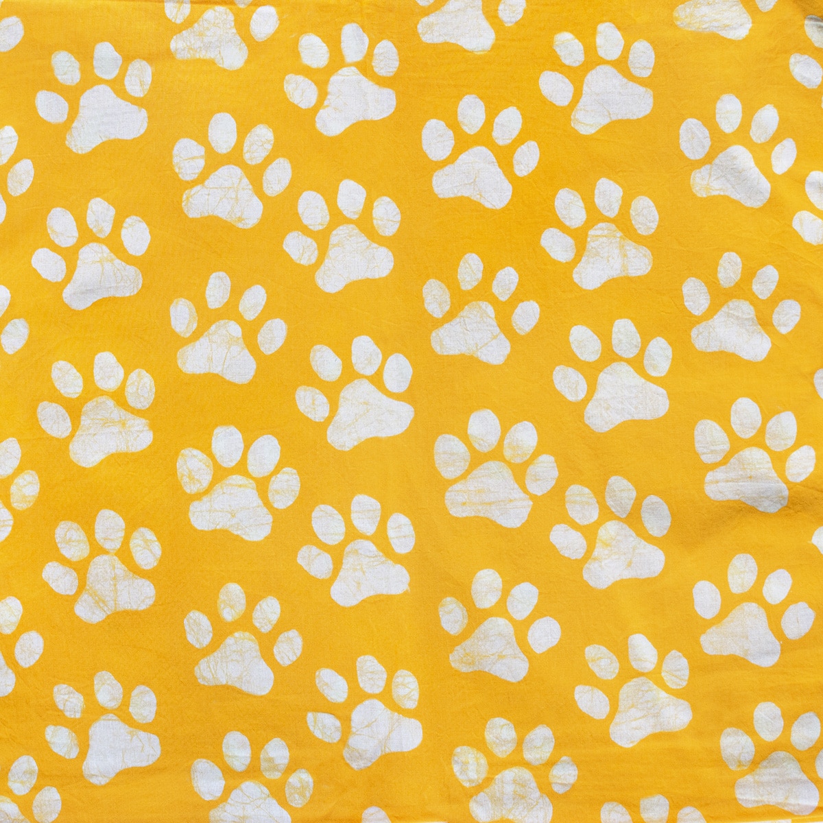 Batik Fabric: Paws – Gold-Organic